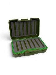 An olive green hard plastic storage case shown open, with dark gray foam inserts in both the lid and base, photographed on a clean white background.